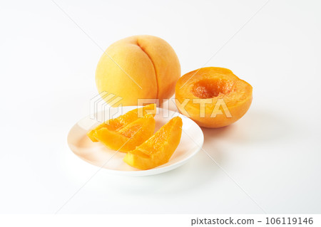 Yellow peach (golden peach) fruit on a white background Yellow peach (golden peach) fruit on a white background 106119146