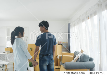 Asian young happy new married couple moving to their new house or real estate. 106119759