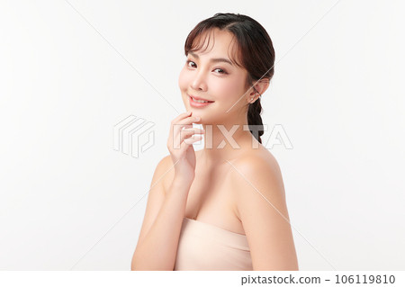 Beautiful young asian woman with clean fresh skin on white background, Face care, Facial treatment, Cosmetology, beauty and spa, Asian women portrait. Beautiful young asian woman with clean fresh skin on white background, Face care, Facial treatment, Cosmetology, beauty and spa, Asian women portrait. 106119810