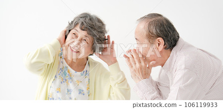 senior couple with hearing loss 106119933