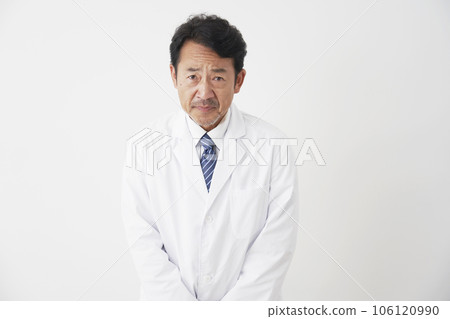 Middle-aged doctor apologizing White background Middle-aged doctor apologizing White background 106120990