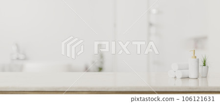 Copy space on a white tabletop with a blurred white elegance bathroom in background. 106121631