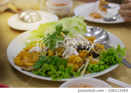 stir fried fish maw on plate, Thailand 106121969