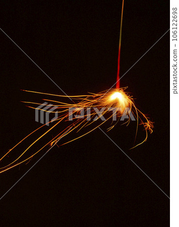 Sparkler shot with slow shutter Sparkler shot with slow shutter 106122698