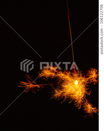 Sparklers, summer tradition, black background Sparklers, summer tradition, black background 106122706