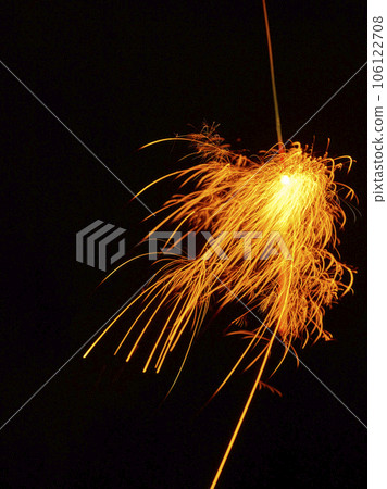 Sparkler shot with slow shutter Sparkler shot with slow shutter 106122708