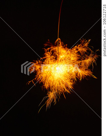 Sparklers, summer tradition, black background Sparklers, summer tradition, black background 106122718