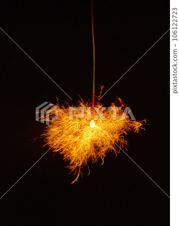 Sparklers, summer tradition, black background Sparklers, summer tradition, black background 106122723