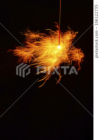 Sparklers, summer tradition, black background Sparklers, summer tradition, black background 106122735