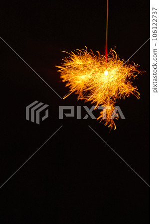 Sparklers, summer tradition, black background Sparklers, summer tradition, black background 106122737