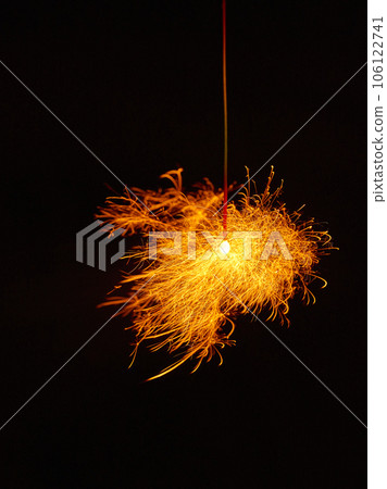 Sparklers, summer tradition, black background Sparklers, summer tradition, black background 106122741