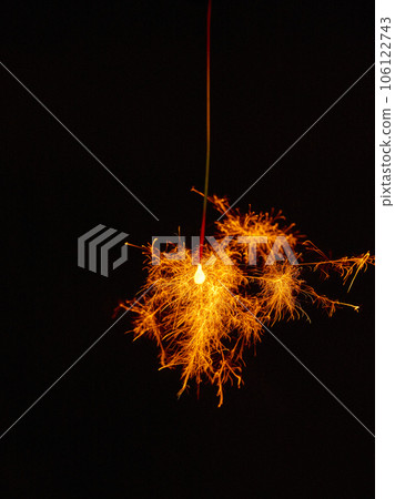 Sparklers, summer tradition, black background Sparklers, summer tradition, black background 106122743