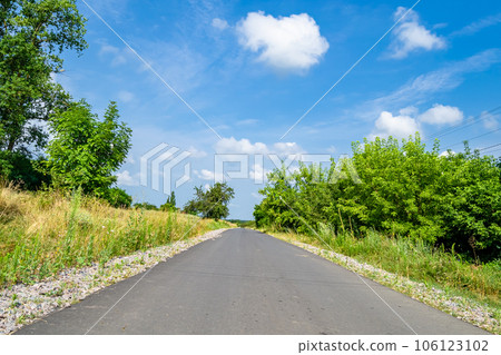 Beautiful empty asphalt road in countryside on colored background Beautiful empty asphalt road in countryside on colored background 106123102