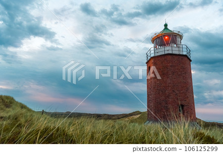 Lighthouse at sunset on Sylt island, Germany Lighthouse at sunset on Sylt island, Germany 106125299