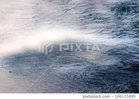 An abstract illustration-like image of a snow storm blowing over a snowy field in a freezing frigid land 106125895