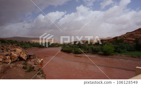 Ajt-Ben-Haddou, Morocco on the Azif Ownira River the day after a storm 106128549
