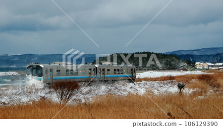 Gono Line train running on the sunny winter coast Gono Line train running on the sunny winter coast 106129390
