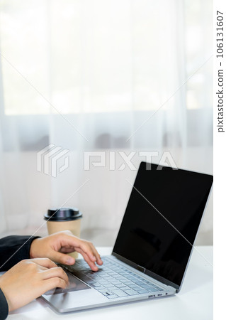 hand use the laptop for search digital information business data 106131607