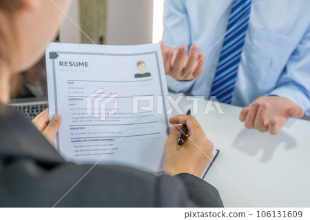 Office executives interviewing job applicants in the meeting room. employer conversation summary work employment 106131609
