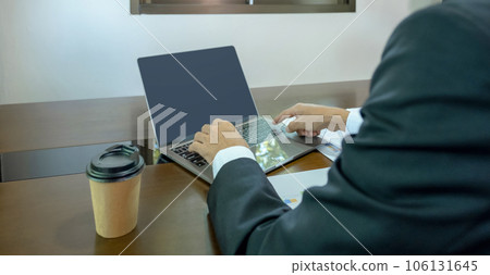 Businessman hand use laptop and analysis the graph at the home office for setting challenging business goals and plan to achieve the new target Businessman hand use laptop and analysis the graph at the home office for setting challenging business goals and plan to achieve the new target 106131645