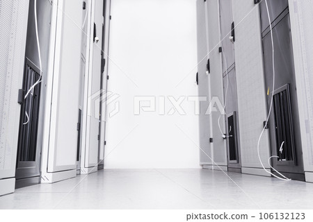 A row of racks with data storage hardware inside server room 106132123