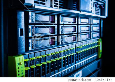 Row of hard drives serving as data storage inside server room 106132138