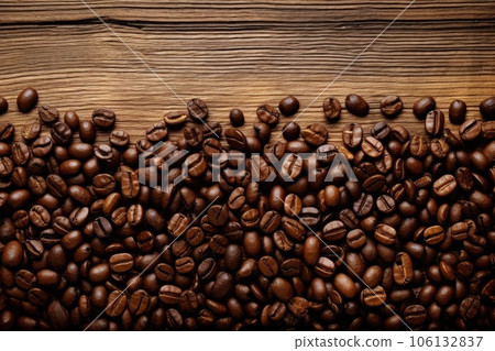Roasted Coffee beans on wooden background, texture and copy spase, top view. 106132837