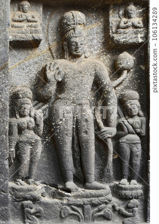 Buddhism Avalokitesvara Sculpture in middle at the entrance of Chaitya hall, Karla Caves, these Caves was constructed between 50 and 70 CE, and 120 CE, located near the Karla, Lonavala in Pune Dist. Buddhism Avalokitesvara Sculpture in middle at the entrance of Chaitya hall, Karla Caves, these Caves was constructed between 50 and 70 CE, and 120 CE, located near the Karla, Lonavala in Pune Dist. 106134289