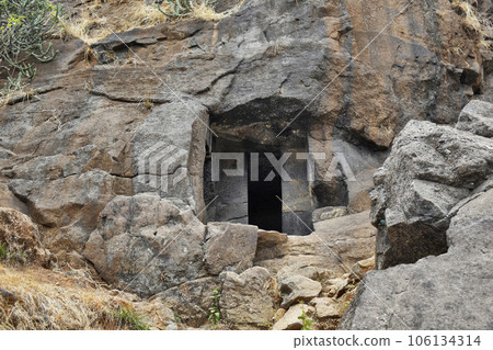 View of Unfinished Vihara showing Cell door, Stairs of Cave No. 20 with rock-cut at Bhaja Caves, Ancient Buddhist built in 2nd century BC, during the Hinayana phase of Buddhism, Lonavala, Maharashtra, 106134314