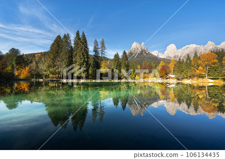 Picturesque view at autumn Welsperg lake in Dolomite Alps 106134435