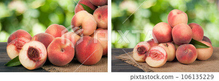 heap of peaches on a wooden table with blurred background 106135229