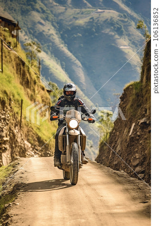 Biker riding his motorbike in the mountain Biker riding his motorbike in the mountain 106136852