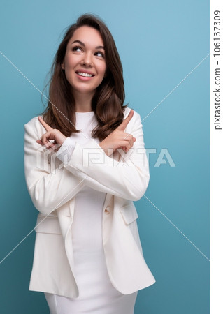 portrait of pensive brunette woman in white dress looking up portrait of pensive brunette woman in white dress looking up 106137309