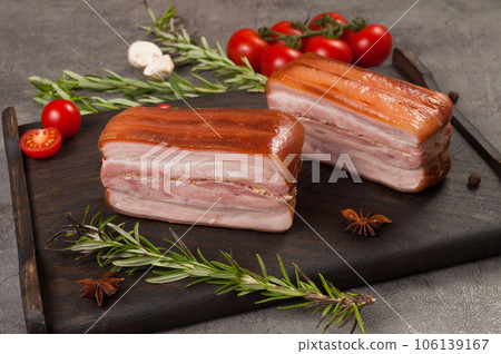 pork brisket smoked boiled on a dark wooden board 106139167