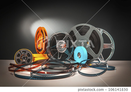 film-themed background, old Super 8 reels film-themed background, old Super 8 reels 106141830