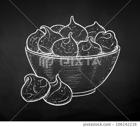 Meringue cookies on chalkboard background Meringue cookies on chalkboard background 106142216