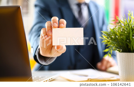 Male arm in suit give blank calling card Male arm in suit give blank calling card 106142641