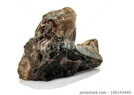 Macro mineral stone smoky quartz, rauchtopaz on a white background 106143440