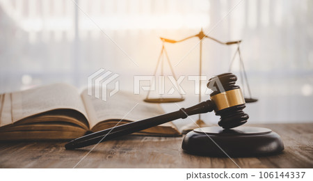 Law theme, mallet of the judge, law enforcement officers, evidence-based cases and documents taken into account. 106144337