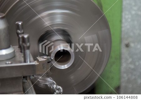 Close up scene the lathe machine rough cut metal tube parts. Close up scene the lathe machine rough cut metal tube parts. 106144808