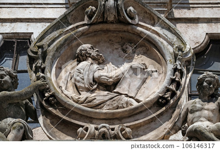 Saint Matthew the Evangelist, statue on facade of the Mantua Cathedral dedicated to Saint Peter, Mantua, Italy Saint Matthew the Evangelist, statue on facade of the Mantua Cathedral dedicated to Saint Peter, Mantua, Italy 106146317