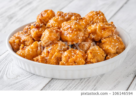 Bowl of orange chicken 106146594