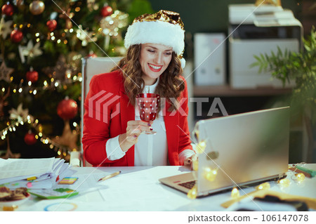 happy stylish small business owner woman having webcam meeting happy stylish small business owner woman having webcam meeting 106147078