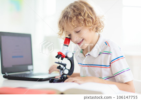 School kids with microscope. Science class. 106147755