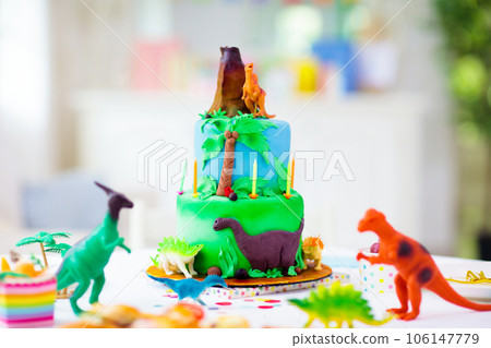 Kids birthday party. Dinosaur theme cake. 106147779