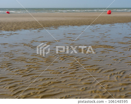 the beach of De Haan at the belgian north sea coast 106148595