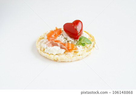 corn cake with cream cheese, salmon and Cherry tomatoe shaped of heart corn cake with cream cheese, salmon and Cherry tomatoe shaped of heart 106148868