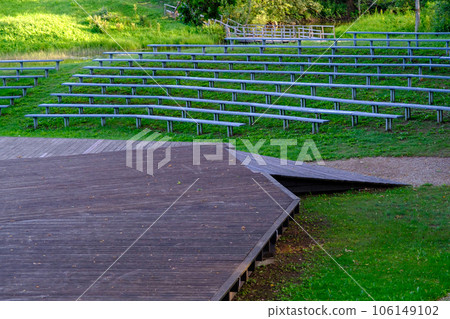 A small outdoor stage made of wooden boards. Latvia, Dikli 106149102