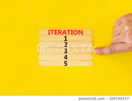 Time to iteration 3 symbol. Concept word Iteration 1 2 3 4 5 on wooden sticks. Businessman hand. Beautiful yellow table yellow background. Business planning and time to iteration 3 concept. Copy space Time to iteration 3 symbol. Concept word Iteration 1 2 3 4 5 on wooden sticks. Businessman hand. Beautiful yellow table yellow background. Business planning and time to iteration 3 concept. Copy space 106149337