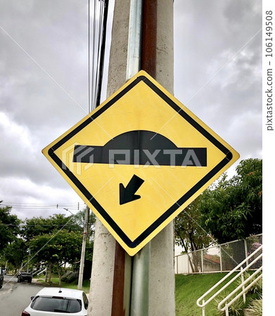Traffic sign indicating bump or speed bump. Advises the vehicle driver on the existence, further down the road, of a bump, bump or transverse undulation on the bearing surface 106149508